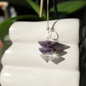 pendule en améthyste et quartz blanc