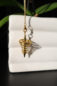 Pendule spirale doré auto draft