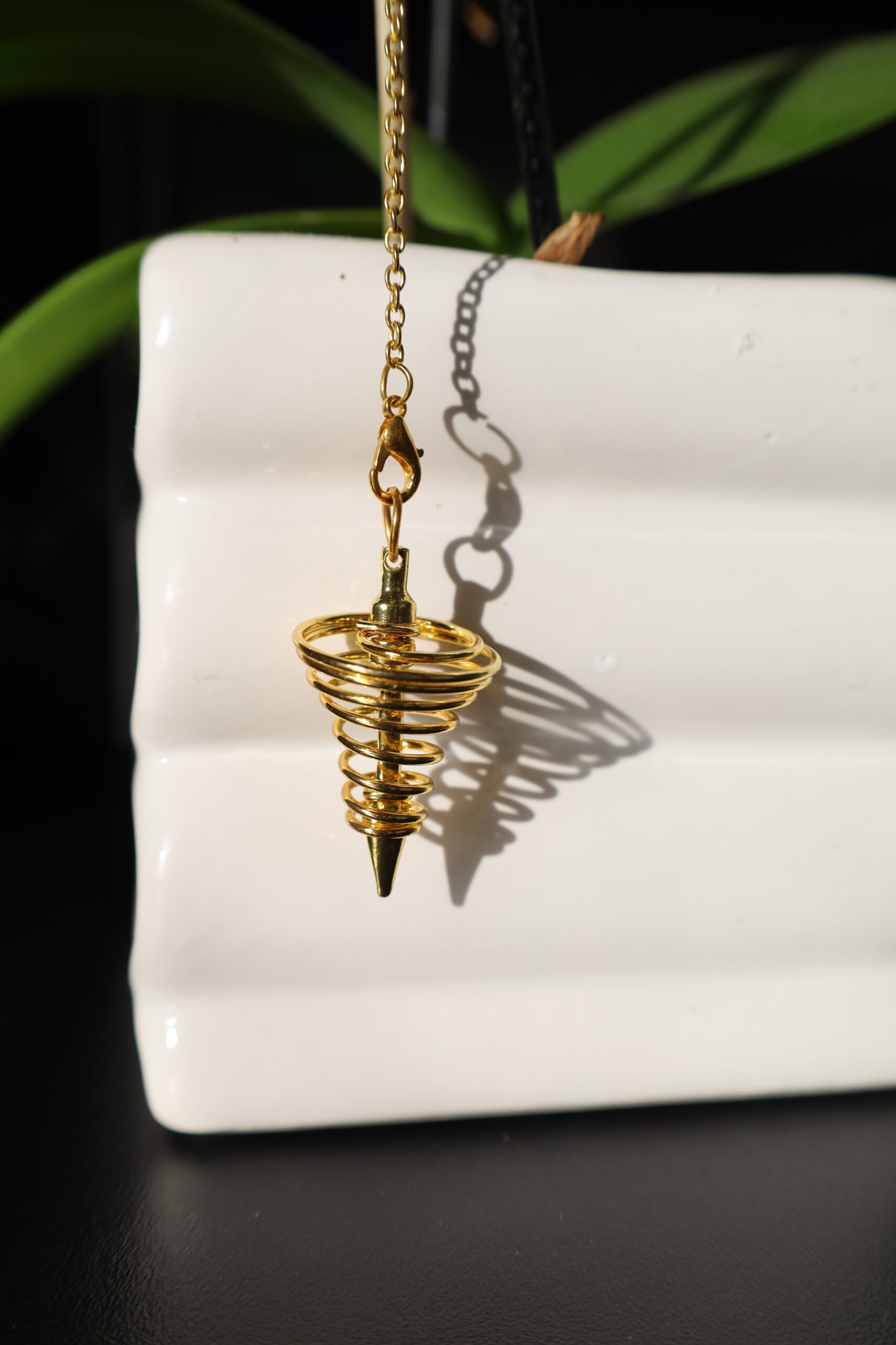 auto draft pendule spirale doré