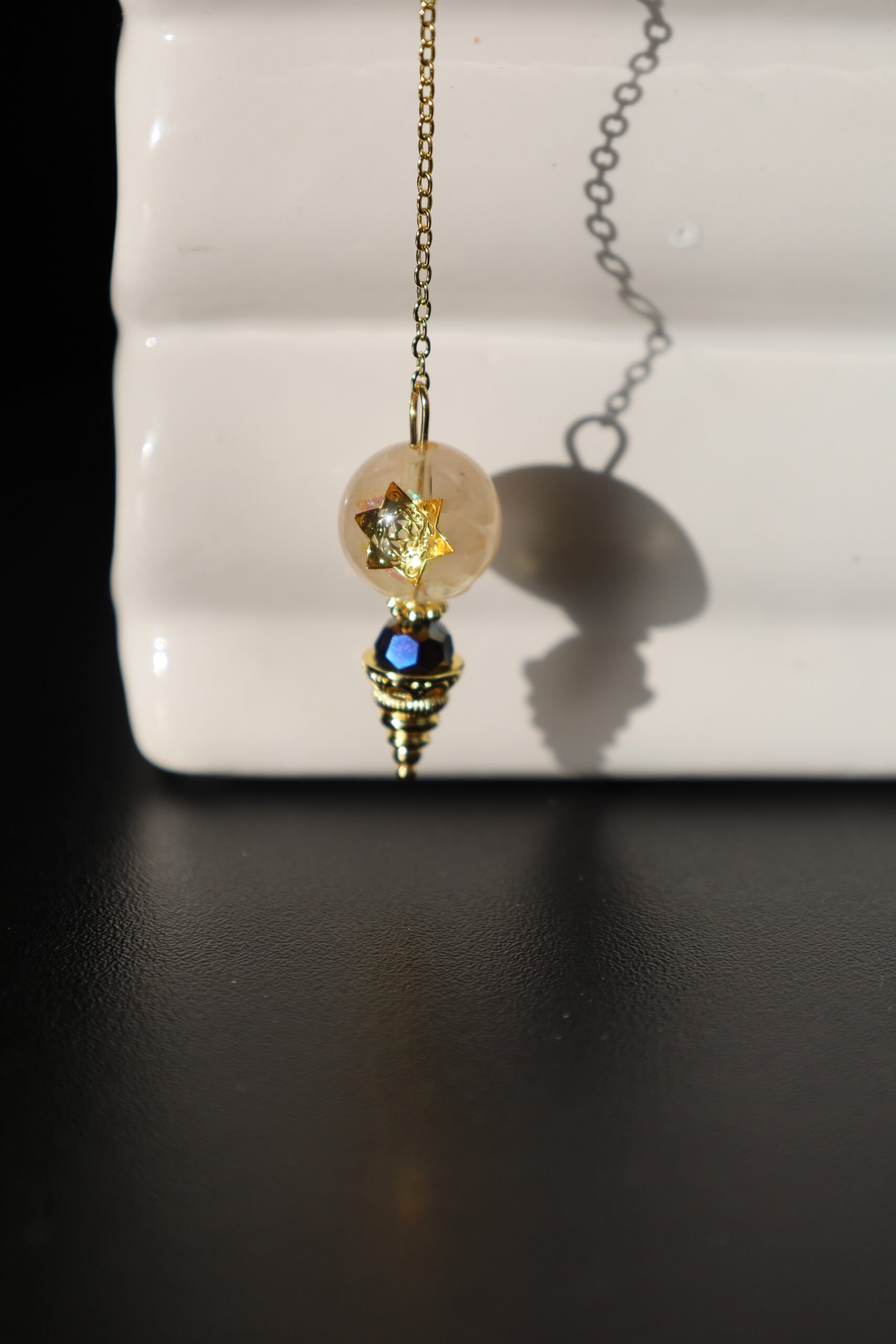 Pendule rond en quartz rose – Image 3