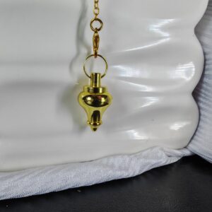 pendule métallisé doré